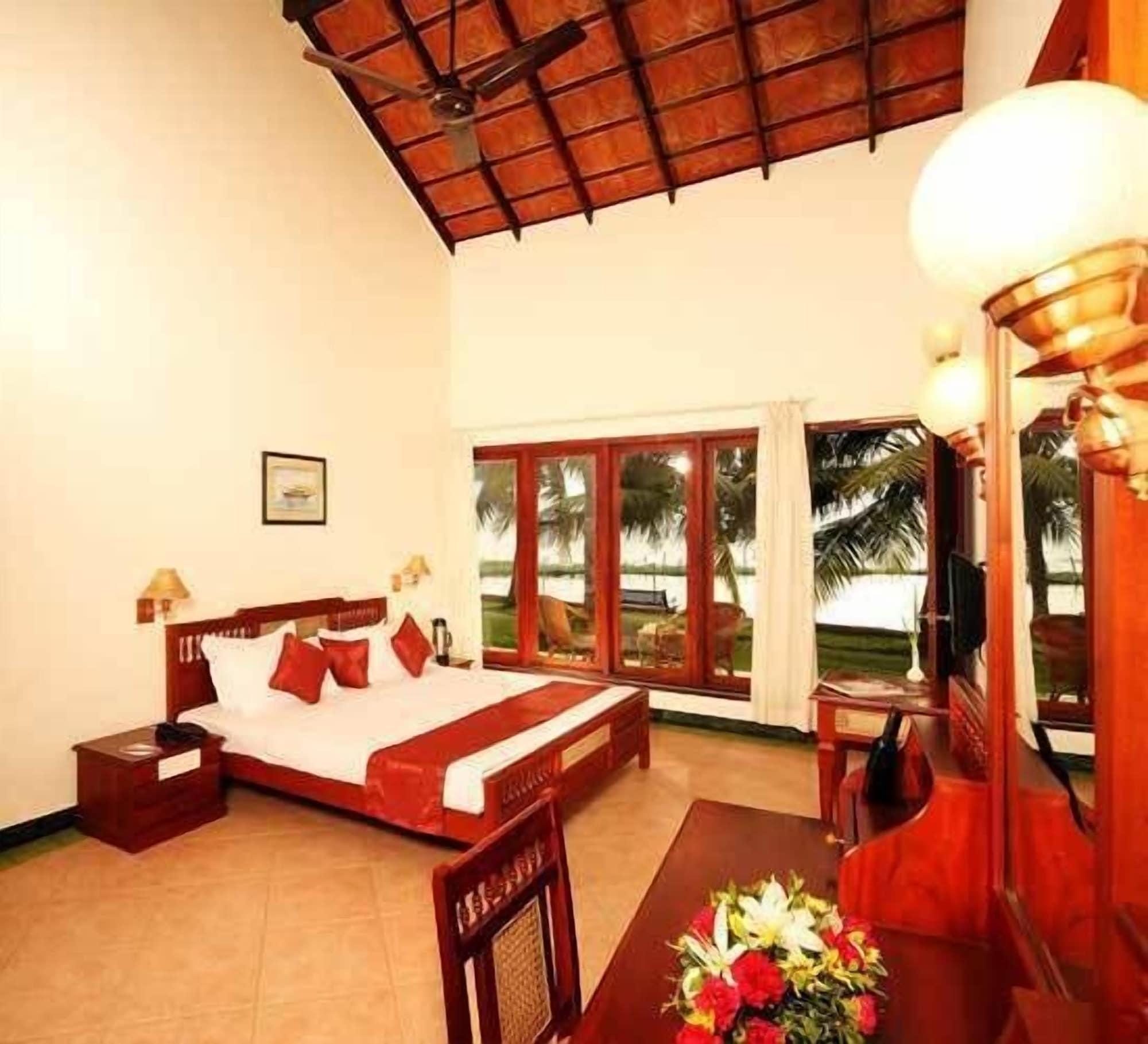 Hotel Abad Whispering Palms Kumarakom Exterior foto